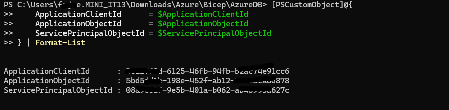 PowerShell output showing redacted application and service principal identifiers